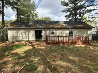 205 Commons Court, New Bern, NC 28560 — 3-bedroom home in Rivershore Commons, New Bern, NC, photo 14 of 15: 205 Commons Dr. Back View