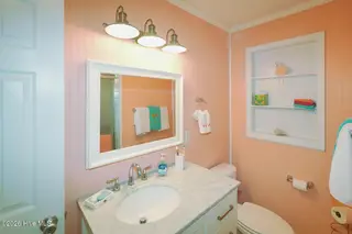 802 E Oak Island Drive, Oak Island, NC 28465 – photo 17: Bathroom-020-021-1500x1000