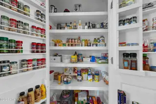 2216 Umstead Lane, Leland, NC 28451 — 3-bedroom home in Brunswick Forest, Leland, NC, photo 15 of 70: 16_pantry