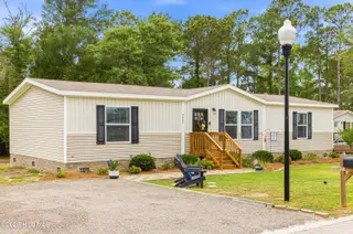 2667 Mill Pond Court SE, Bolivia, NC 28422 — 3-bedroom manufactured home in Cypress Lakes, Bolivia, NC, photo 2 of 36