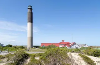 1238 Skystone Loop NE Lot 73, Supply, NC 28462 — 3-bedroom home in Lockwood Landing, Supply, NC, photo 23 of 30: Oak Island Lighthouse