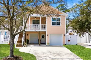135 NE 75th Street, Oak Island, NC 28465 – photo 2: Front