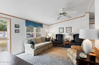 7203 Banner Street SW, Ocean Isle Beach, NC 28469 — 3-bedroom manufactured home in Seaside Heights, Ocean Isle Beach, NC, photo 7 of 38: Living Area