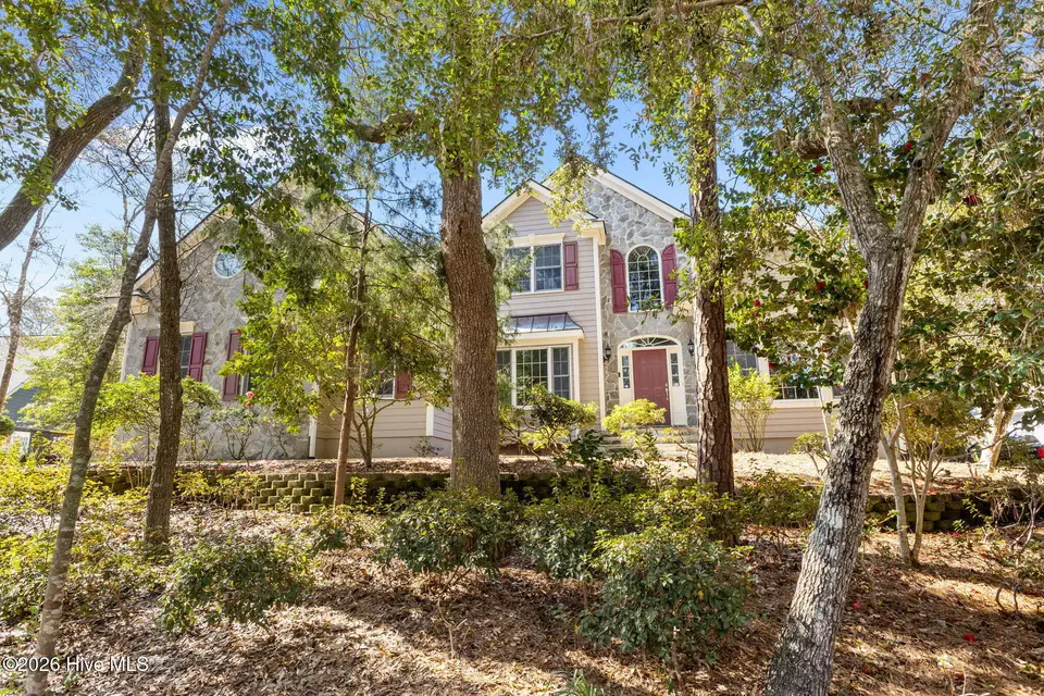121 Oakleaf Drive, Pine Knoll Shores, NC 28512 – photo 1 of 50: Oakleaf front