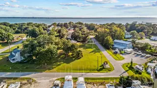 201 1 Pensacola Avenue, Morehead City, NC 28557 – photo 1: Drone shot towards Bogue Sound