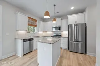 910 Terraces Lane, Hampstead, NC 28443 – photo 13: 32-web-or-mls-_RAD6879