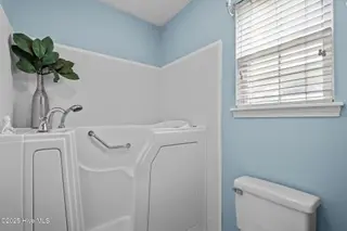 213 NE 48th Street, Oak Island, NC 28465 – photo 19: 22-web-or-mls-Photo Aug 21 2025, 10 55 0