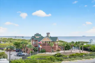 7004 E Beach Drive, Oak Island, NC 28465 – photo 5: 105-www