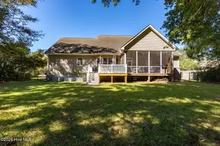 165 Cedar Lane, Newport, NC 28570 — 3-bedroom home in Gull Harbor, Newport, NC, photo 3 of 48: Rear Exterior w/ Screened Porch