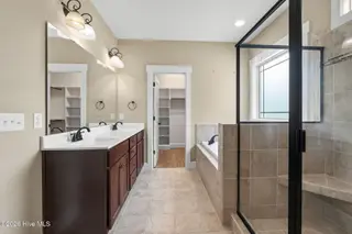 131 Nashville Drive, Archer Lodge, NC 27527 – photo 17: Separate Tub & Shower