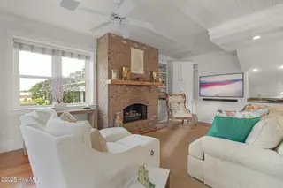 2108 Shepard Street, Morehead City, NC 28557 – photo 15: Stunning brick fireplace in living room