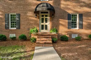113 Edinborough Court, Rocky Mount, NC 27803 – photo 2: Classic Brick Curb Appeal