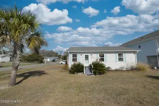 802 E Oak Island Drive, Oak Island, NC 28465 – photo 4: Exterior Front-008-016-1500x1000