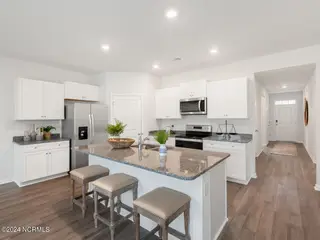 1510 W White Egret Lane NE Lot 743, Bolivia, NC 28422 – photo 8: BellaPoint20513kitDRHorton-008-018-1280x