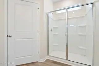 3583 Whaley Way NW, Ash, NC 28420 — 3-bedroom townhome in Brunswick Plantation, Ash, NC, photo 17 of 34: Walk in Shower