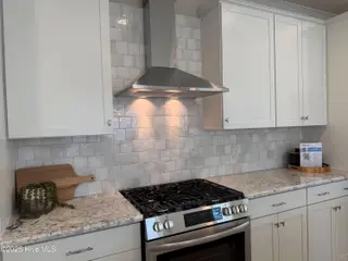 2482 Lake Ridge Drive, Southport, NC 28461 – photo 8: Kitchen/Hood Vent