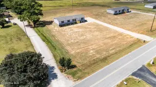 3870 Barnes Hill Church Road, Nashville, NC 27856 – photo 13: 13-web-or-mls-DJI_20250904132101_0027_D