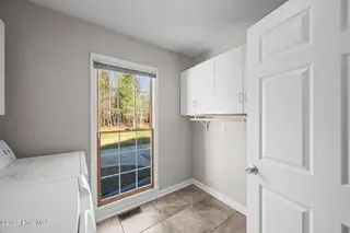 400 Carolina Pines Boulevard, New Bern, NC 28560 – photo 15: Storage In Laundry Room