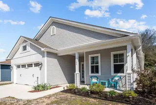 106 NW 19th Street, Oak Island, NC 28465 – photo 1: Front