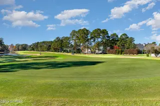 1214 Woodhouse Drive NW, Ash, NC 28420 – photo 24: Golf course 4