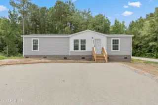 6777 Lewis Drive SE, Winnabow, NC 28479 – photo 1: 6777 Lewis Dr