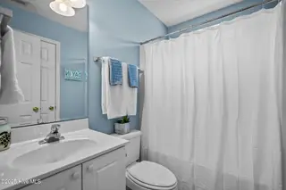 213 NE 48th Street, Oak Island, NC 28465 – photo 23: 38-web-or-mls-Photo Aug 21 2025, 11 06 3
