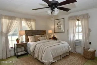 211 Paul Hare Road, Goldsboro, NC 27530 – photo 8: Bedroom 1 Ai Staged