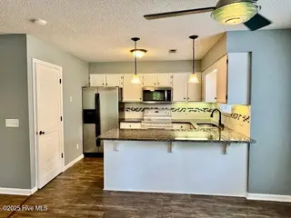 2928 Mulberry Lane A, Greenville, NC 27858 – photo 22: View of Kitchen from Dining Room