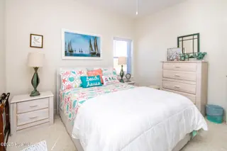 1131 S Shore Drive, Surf City, NC 28445 – photo 10: Top Floor Queen Bedroom with Shared Bath