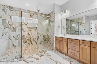 520 S Middleton Drive NW, Calabash, NC 28467 – photo 23: Master Bath - Wet Room