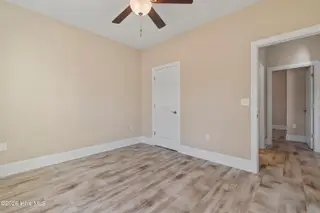 123 Bellwood Circle, Sunset Beach, NC 28468 – photo 23: Guest bedroom 1