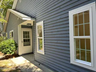 1080 Valley Drive SW, Calabash, NC 28467 — 2-bedroom home in Hidden Valley, Calabash, NC, photo 2 of 31: Front Entrance