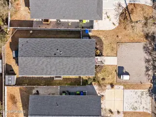 217 NE 75th Street, Oak Island, NC 28465 – photo 4: 8-web-or-mls-DJI_20260212110226_0005_D -