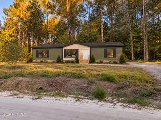 486 Scuppernong Circle SE, Bolivia, NC 28422 — 4-bedroom manufactured home in Vineyard Landing, Bolivia, NC, photo 1 of 4: Front