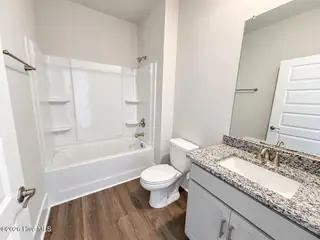 8615 Blue Haw Way Lot 125, Leland, NC 28451 — 3-bedroom home in Indigo Preserve, Leland, NC, photo 15 of 41: Guest Bath