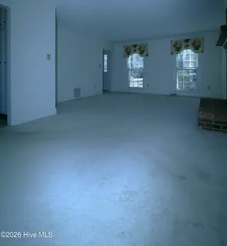 1313 Rondo Drive, Greenville, NC 27858 – photo 5: Dining View into Living Room