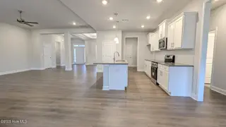 626 Sweet Potato Lane Lot 37, Nashville, NC 27856 – photo 14: kitchen and living room