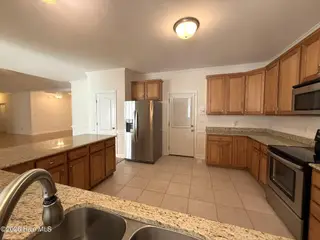 103 Castelnau Court, Jacksonville, NC 28540 — 5-bedroom home in Williamsburg Plantation, Jacksonville, NC, photo 11 of 52: 7. Kitchen C