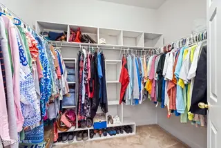 256 Downing Glen Place, Calabash, NC 28467 — 4-bedroom home in The Farm, Calabash, NC, photo 21 of 42: Primary closet