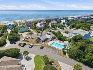 9936 Louise Howard Court East, Emerald Isle, NC 28594 — 3-bedroom townhome in Spinnakers Reach, Emerald Isle, NC, photo 23 of 32: Spinnakers Reach Community Pool