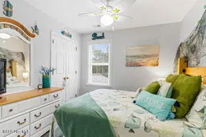 124 NE 15th Street, Oak Island, NC 28465 – photo 18: thumbnail-0196a7bd-01a8-73b8-9272-781a27