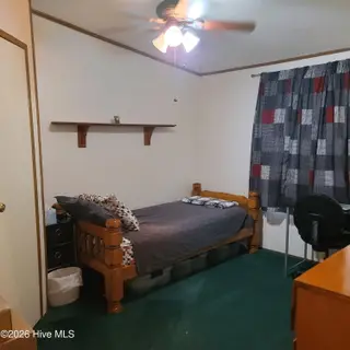 107 Eagle Ridge Drive, Dudley, NC 28333 — 4-bedroom manufactured home in Eagle Ridge, Dudley, NC, photo 14 of 17: Secondary Bedroom