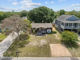 132 NE 3rd Street, Oak Island, NC 28465 – photo 3: 6-web-or-mls-DJI_20250730114142_0821_D