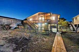 2021 W Dolphin Drive, Oak Island, NC 28465 – photo 3: 2021WestBeachDrivetwilight-5