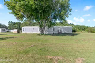 712 Longwood Road NW, Ocean Isle Beach, NC 28469 — 3-bedroom manufactured home, Ocean Isle Beach, NC, photo 1 of 33: 712LongwoodRdNW - 1