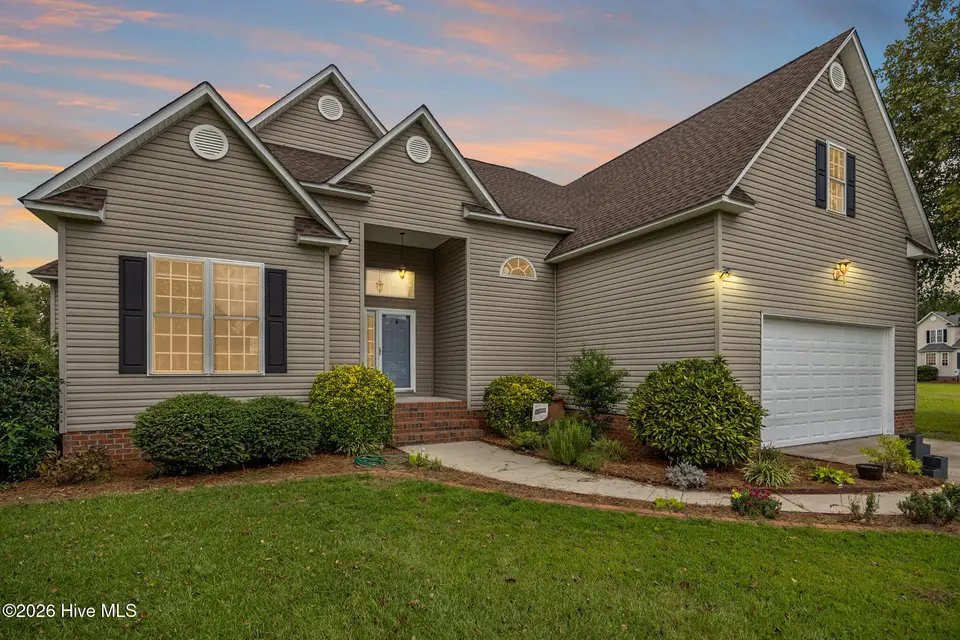 2616 Spring Creek Drive, Grimesland, NC 27837 – photo 1 of 34: Twilight front
