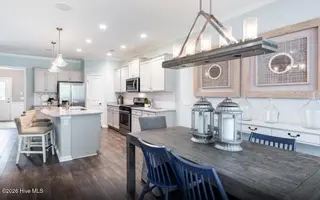 3405 Rendevous Bay Drive, Shallotte, NC 28470 — 5-bedroom home in Solserra, Shallotte, NC, photo 2 of 26: Cafe to Kitchen