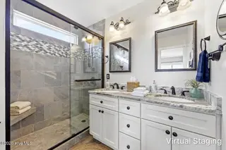 1426 N New River Drive, Surf City, NC 28445 – photo 22: Master Bath Virtually Staged