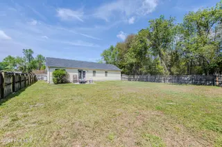 126 Forest Bluff Drive, Jacksonville, NC 28540 — 3-bedroom home in River Hills, Jacksonville, NC, photo 18 of 22: Backyard
