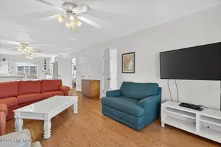 4328 E Dolphin Drive, Oak Island, NC 28465 – photo 9: 09-kahunaphoto - Copy
